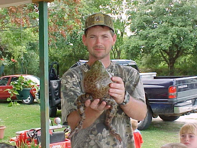 Dennis holding a gigantor bull frog
