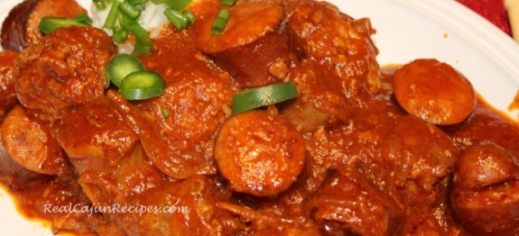 Fresh and Smoked Sausage in Tomato Gravy