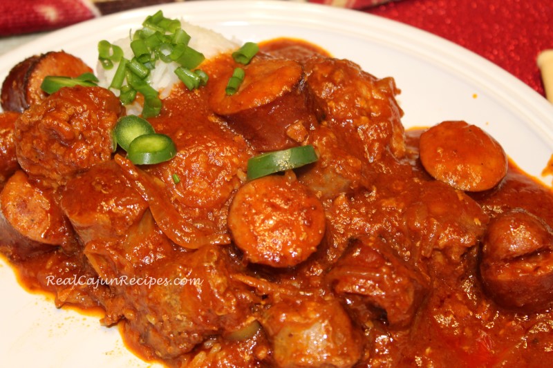 Fresh and Smoked Sausage in Tomato Gravy