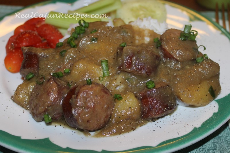 Smothered Potatoes with Sausage and Tasso Cooked Up in Rice Cooker